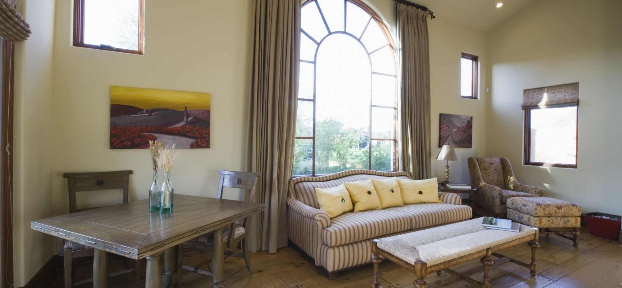 how to hang curtains on arched window
